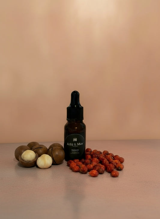 Restore oil Black dropper bottle with 'Ada & May' branding on a gray background